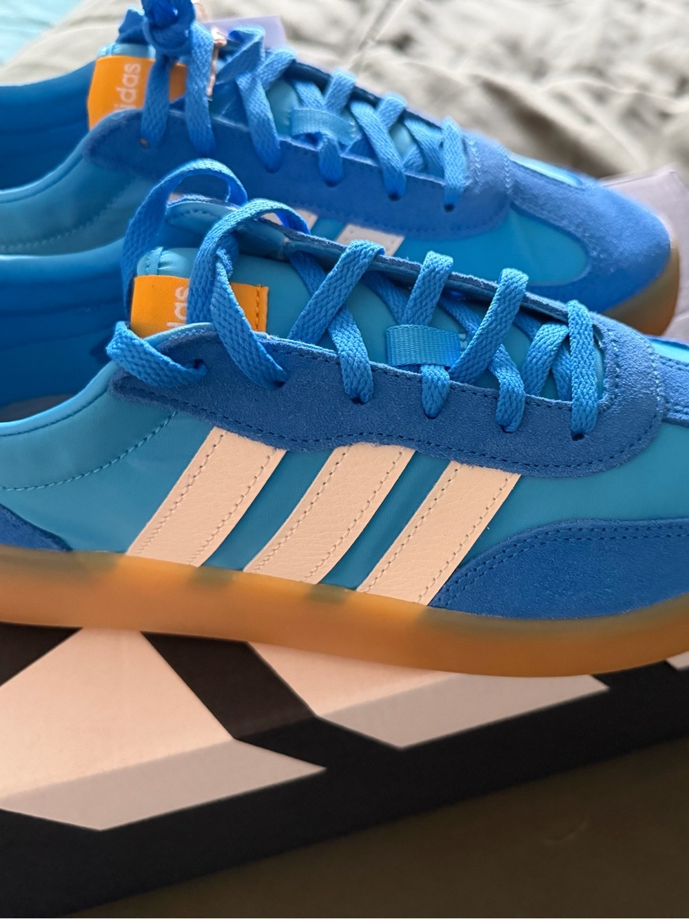 adidas youth/women’s Bright Blue Sneakers with White Stripes